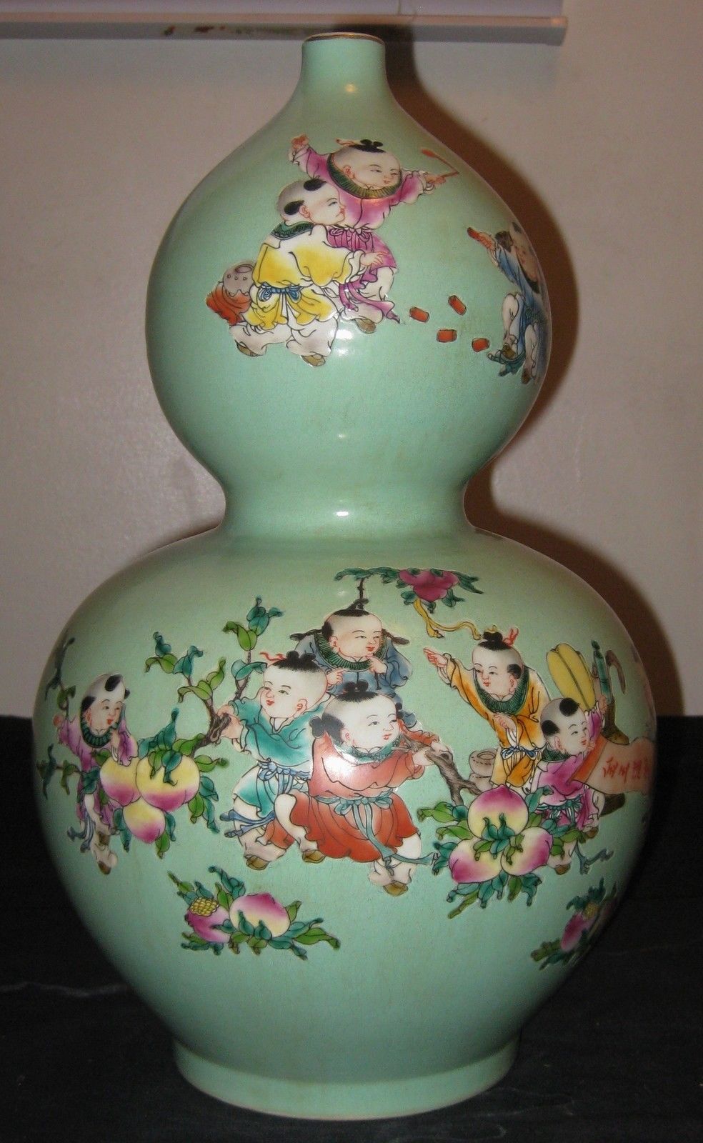 CHINESE PORCELAIN CELADON GROUND & FAMILLE ROSE DOUBLE GOURD VASE, 19TH CENTURY.