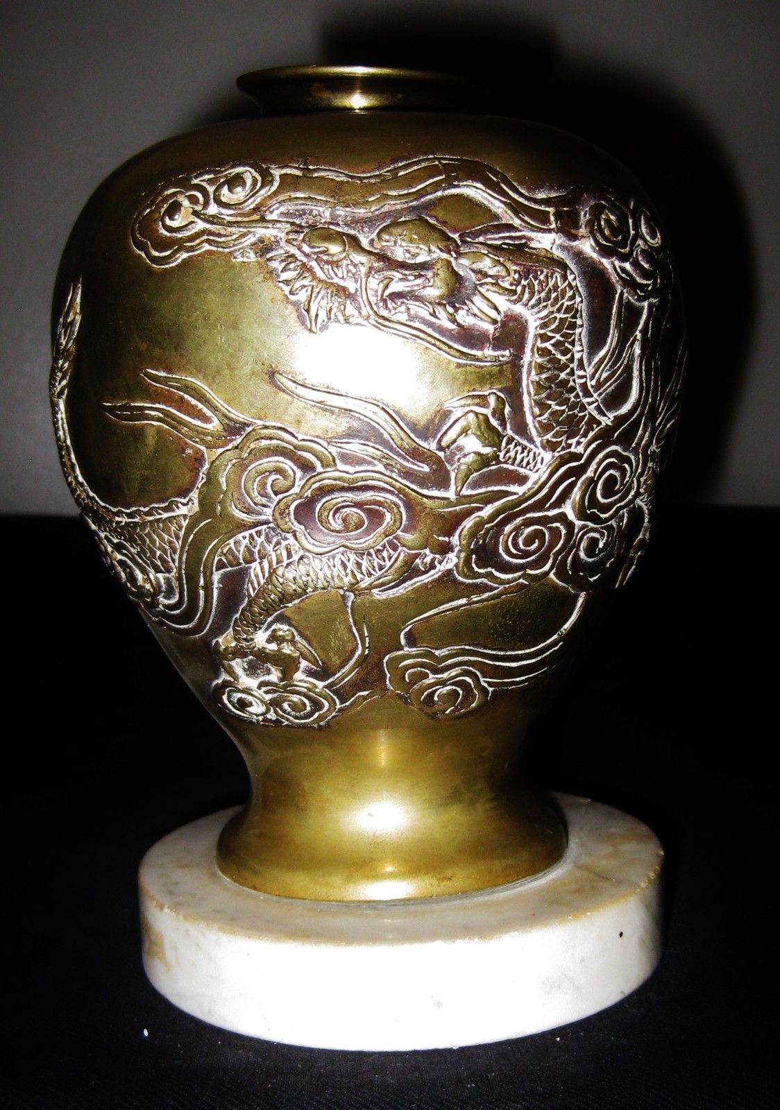 ANTIQUE CHINESE HAND CARVED GILT SILVER DRAGON BRASS VASE WITH MABLE BASE.