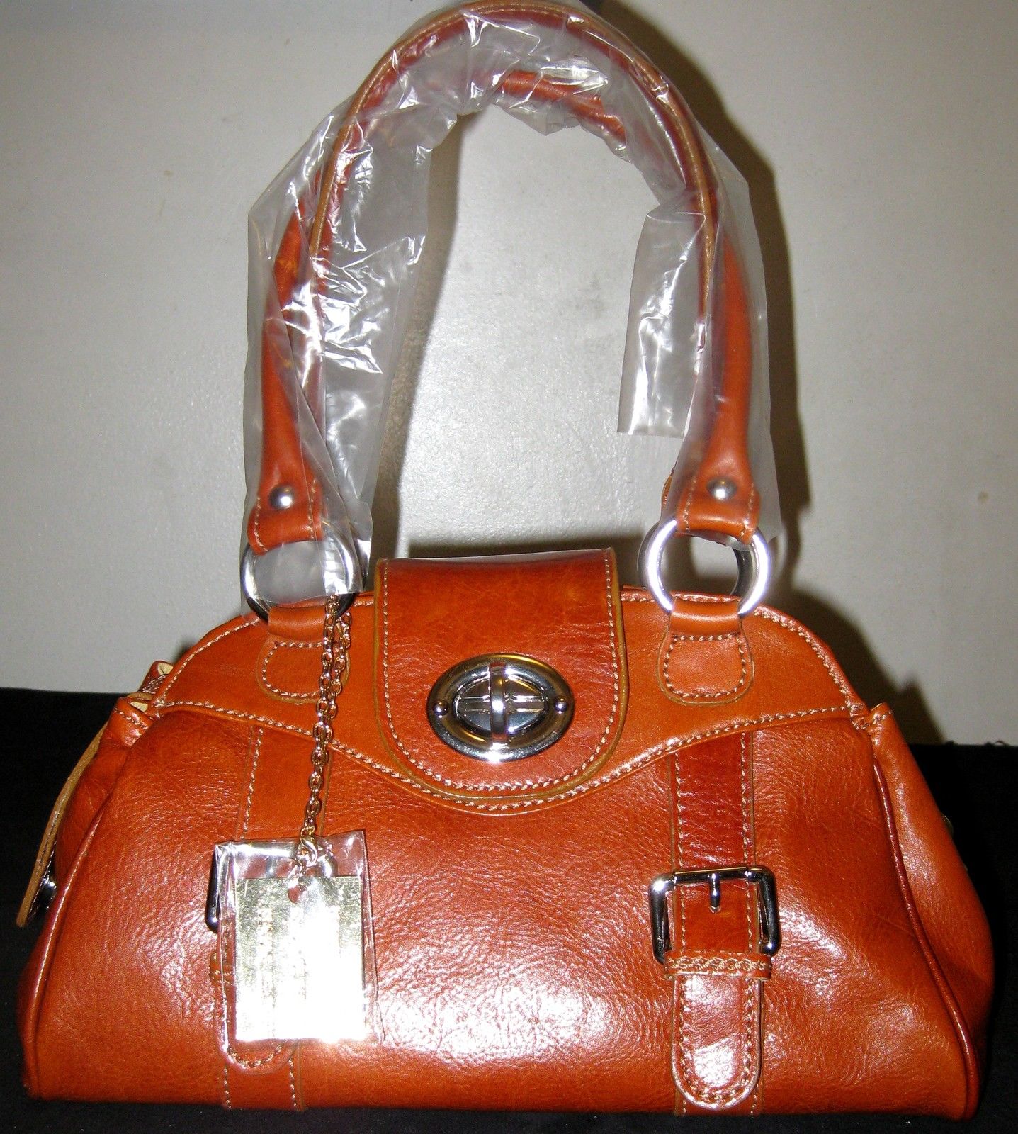 100% Italy Leather Shoulder Bags-Tower Bridge Handbags Orange Color.